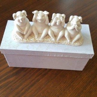 Four Pigs or Right Behaviour Statue